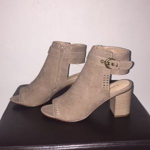 Francesca’s tan mid high heels